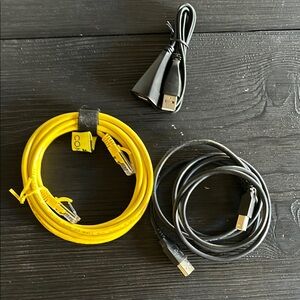 A lot of electronics cables, printer, ethernet